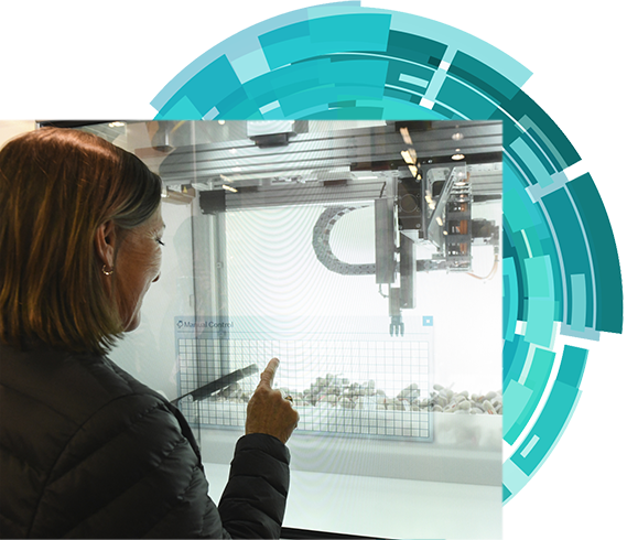 Woman pointing at objects in a display